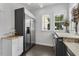 Spacious laundry area with modern appliances, abundant counter space, and natural light at 5801 Marleon Drive Marleon Drive, Windermere, FL 34786