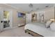 Bright and airy main bedroom with backyard views, a walkout door, and a television at 5801 Marleon Drive Marleon Drive, Windermere, FL 34786