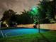 Illuminated multi-sport court featuring basketball and tennis at night at 5801 Marleon Drive Marleon Drive, Windermere, FL 34786