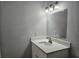 Bathroom featuring updated vanity with new sink, faucet, and countertop at 5980 Westgate Dr Dr # 202, Orlando, FL 32835
