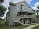 A side view of the two-story apartment building at 5980 Westgate Dr Dr # 202, Orlando, FL 32835