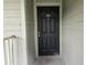 Unit 202, featuring a black door and an ornate door knocker at 5980 Westgate Dr Dr # 202, Orlando, FL 32835