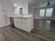 Updated kitchen includes stainless appliances and white cabinets at 5980 Westgate Dr Dr # 202, Orlando, FL 32835