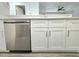 Bright kitchen features modern stainless steel appliances and white cabinetry at 5980 Westgate Dr Dr # 202, Orlando, FL 32835