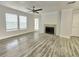 Bright living room features gray flooring and natural light at 5980 Westgate Dr Dr # 202, Orlando, FL 32835