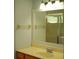 Bright bathroom featuring vanity, mirror, lighting, and towel rack at 6500 Abercrombie Ct, Orlando, FL 32835