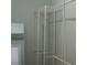 White closet organizing system with shelving and hanging rods at 6500 Abercrombie Ct, Orlando, FL 32835