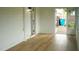 Sunroom with wood-look vinyl flooring and white walls at 6500 Abercrombie Ct, Orlando, FL 32835