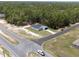 Aerial view of a newly constructed home on a large lot surrounded by lush greenery at 6516 Sw 149 Th Lane Rd, Ocala, FL 34473