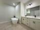 Modern bathroom with dual vanity, tub, and separate shower offers luxury at 6516 Sw 149 Th Lane Rd, Ocala, FL 34473