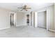 Bright bedroom features an ensuite bathroom, closet, and neutral tones for comfortable living at 7184 Maleberry Run, Winter Garden, FL 34787