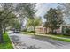 Quiet street showcasing well-maintained homes and mature trees in a desirable neighborhood at 7184 Maleberry Run, Winter Garden, FL 34787