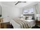 Cozy bedroom featuring a comfortable bed, bedside tables, and natural light at 826 Garden Plz, Orlando, FL 32803