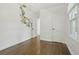 Bright bedroom with hardwood floors, koala decals on walls and natural light from windows at 826 Garden Plz, Orlando, FL 32803