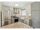 Modern kitchen features stainless steel appliances, granite counters, and a bright, functional design at 826 Garden Plz, Orlando, FL 32803