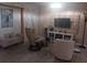 Cozy living room with neutral paint, light fixtures, and modern decor at 833 Channing Rd, Lakeland, FL 33805