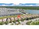Overhead view of a residential area featuring single-Gathering homes and townhomes with community amenities at 8901 Rhodes St, Kissimmee, FL 34747