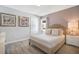 This cozy bedroom offers a comfortable bed, soft lighting, and a tranquil atmosphere at 8901 Rhodes St, Kissimmee, FL 34747