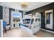 Fun bedroom featuring a bunk bed with space decor and a window at 8901 Rhodes St, Kissimmee, FL 34747