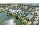 Stunning aerial view of a community pool and lazy river with lush landscaping at 8901 Rhodes St, Kissimmee, FL 34747
