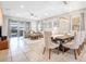 Bright living area leads to dining space with views of a well maintained backyard at 8901 Rhodes St, Kissimmee, FL 34747
