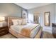 Bright main bedroom with ensuite bathroom view and modern decor at 8901 Rhodes St, Kissimmee, FL 34747