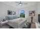 Cozy bedroom showcasing a comfortable bed and natural light at 912 Pickfair Ter, Lake Mary, FL 32746