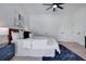 Bright bedroom with white walls, light wood floors, and two closets at 912 Pickfair Ter, Lake Mary, FL 32746