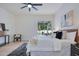 This bedroom offers a ceiling fan and access to the outdoors through a sliding glass door at 912 Pickfair Ter, Lake Mary, FL 32746