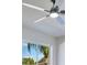 Close up on a modern ceiling fan with integrated lighting and multiple blades at 912 Pickfair Ter, Lake Mary, FL 32746