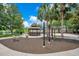 Outdoor exercise equipment, gazebo, and playground are part of this community's recreational amenities at 912 Pickfair Ter, Lake Mary, FL 32746
