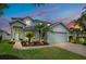 Charming two-story home with landscaped yard and a two-car garage at 912 Pickfair Ter, Lake Mary, FL 32746