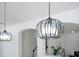 Modern pendant lights hanging over a kitchen island at 912 Pickfair Ter, Lake Mary, FL 32746