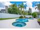 Beautiful backyard pool and spa with lush landscaping and a privacy fence create a serene oasis at 912 Pickfair Ter, Lake Mary, FL 32746