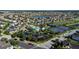 Overhead shot featuring the community pool, tennis courts, playground, and other amenities at 10072 Sunnifa Aly, Orlando, FL 32832