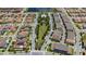 Birds eye view shows central green areas with mature trees and walkways in this housing community at 10072 Sunnifa Aly, Orlando, FL 32832