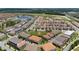 Stunning aerial view shows home location within a well-planned community and green common area at 10072 Sunnifa Aly, Orlando, FL 32832