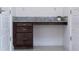 Room featuring a small built-in desk with granite countertop and three-drawer set at 10072 Sunnifa Aly, Orlando, FL 32832
