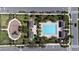Overhead view of the community pool, playground and surrounding landscaping at 10072 Sunnifa Aly, Orlando, FL 32832