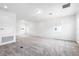 Spacious bonus room offers plush carpeting, recessed lighting and natural light through bright windows at 12216 Encore At Ovation Way, Winter Garden, FL 34787