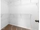 Walk-in closet with wire shelving at 12216 Encore At Ovation Way, Winter Garden, FL 34787