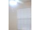 Bedroom window with horizontal blinds allowing natural light at 13584 Turtle Marsh Loop # 12, Orlando, FL 32837