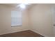 Bedroom featuring hardwood floors, a window, and a ceiling fan at 13584 Turtle Marsh Loop # 12, Orlando, FL 32837