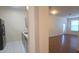 Open kitchen view featuring stainless appliances, light countertops and white cabinets at 13584 Turtle Marsh Loop # 12, Orlando, FL 32837