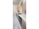 The kitchen has stainless steel sink, granite countertops and tiled backsplash at 13584 Turtle Marsh Loop # 12, Orlando, FL 32837
