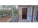 A view from the screened porch looking out into the yard and trees at 13584 Turtle Marsh Loop # 12, Orlando, FL 32837