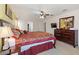 Spacious bedroom featuring neutral walls and a ceiling fan at 148 Miro Dr, Davenport, FL 33837