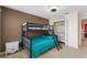 Charming bedroom featuring a bunk bed, stylish decor and a closet with a crib at 148 Miro Dr, Davenport, FL 33837