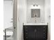 Chic powder room boasts a modern vanity, stylish fixtures, and ample counter space at 150 E Robinson St # 407, Orlando, FL 32801