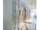 The Vue at Lake Eola hallway features glass door and view of art gallery at 150 E Robinson St # 407, Orlando, FL 32801